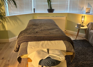 Serenity Therapy - Massage & Wellbeing room with cozy massage table in Bournemouth, England, GB.