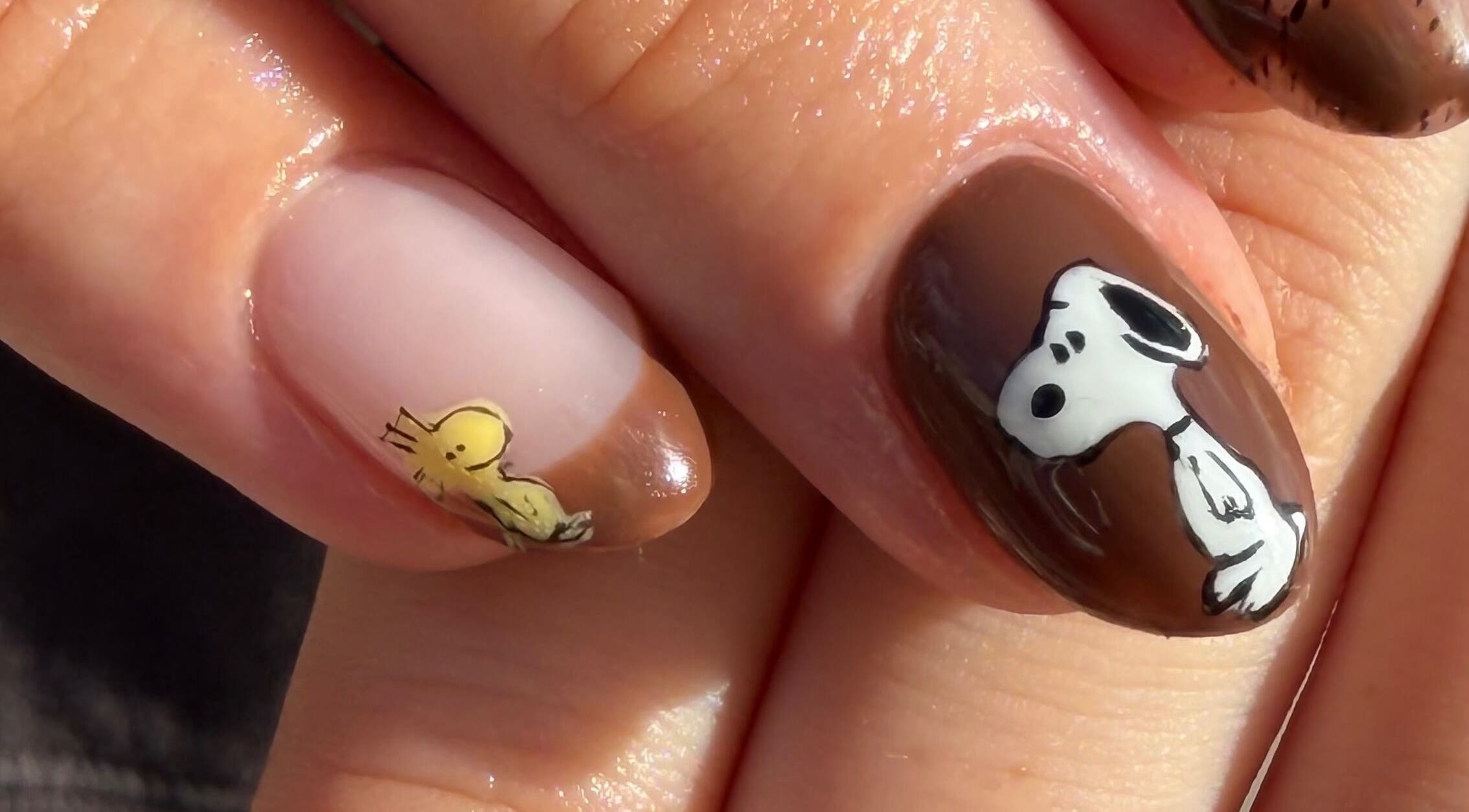 Cute cartoon nail art at The Claw Couture in South Jordan, Utah, US showcases detailed charm and artistry.
