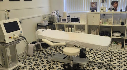 Treatment room at Bloom Skin Studio with equipment and relaxation setup, Burton Upon Trent, England, GB.
