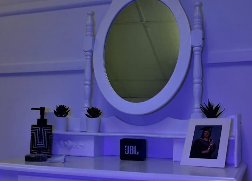 Elegant vanity at Bloom Skin Studio in Burton Upon Trent, England, GB with mirror and decor.