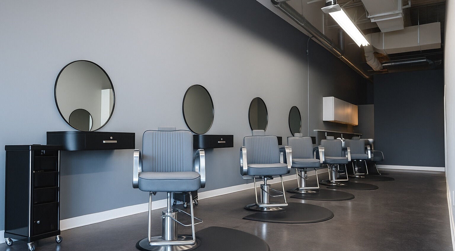 Modern salon chairs and mirrors at Arise and Shine K in Jonesboro, Georgia, US.