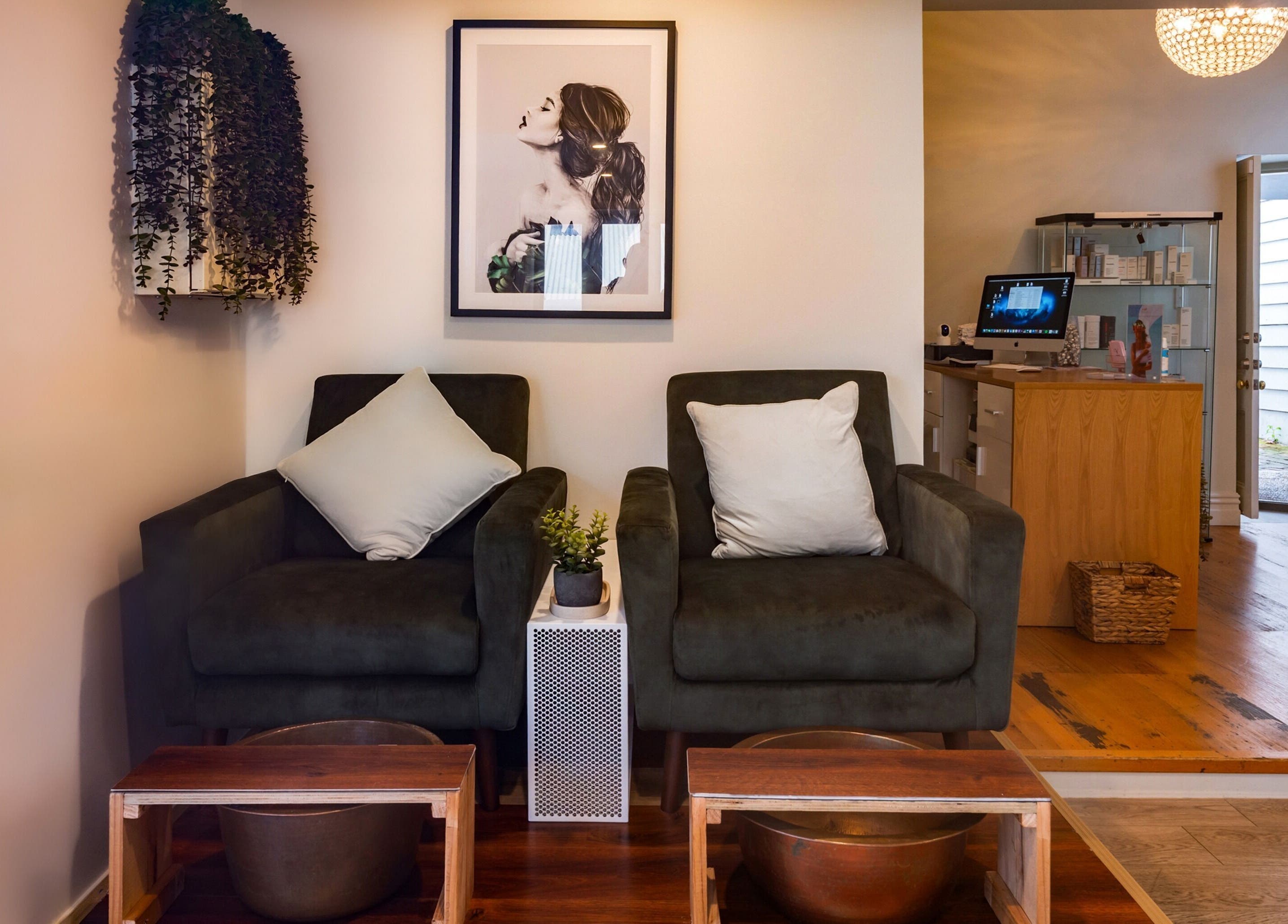 Relaxing seating area at Verdo Beauty Parnell, Auckland, NZ featuring plush chairs and serene decor.