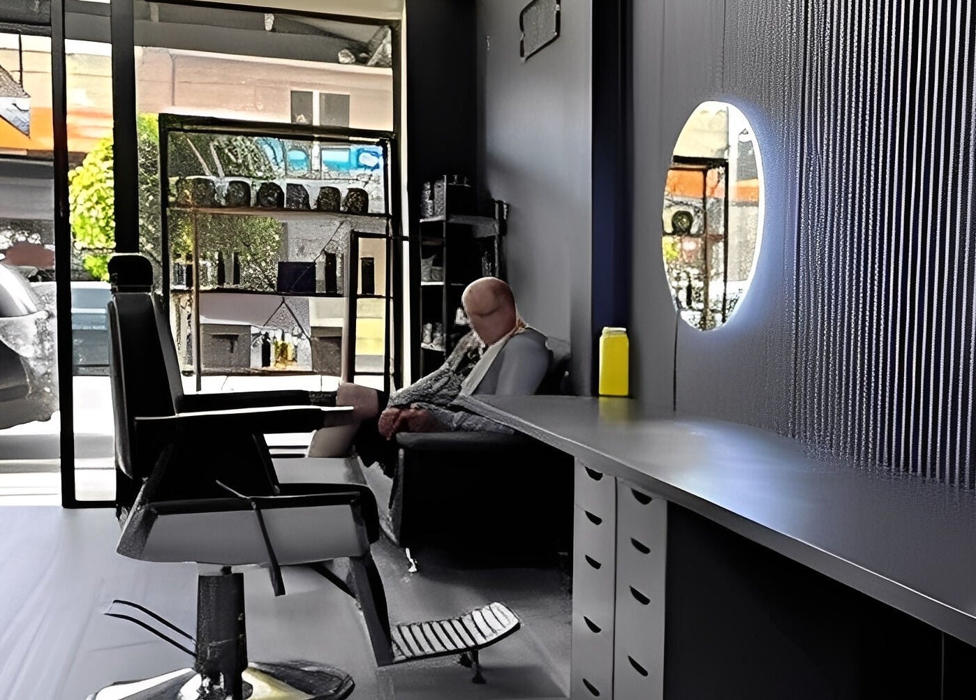 Interior of Awesome Barbers in Melbourne, Victoria, AU, featuring a sleek chair and stylish decor.