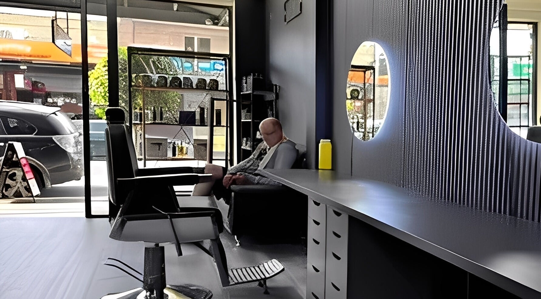 Interior of Awesome Barbers in Melbourne, Victoria, AU, featuring a sleek chair and stylish decor.