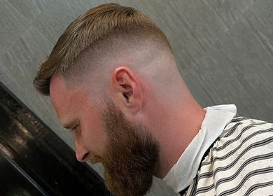 Close-up of a stylish men's haircut at Barbershop AK-15, Nusa Tenggara Barat, Nusa Tenggara Barat, ID.