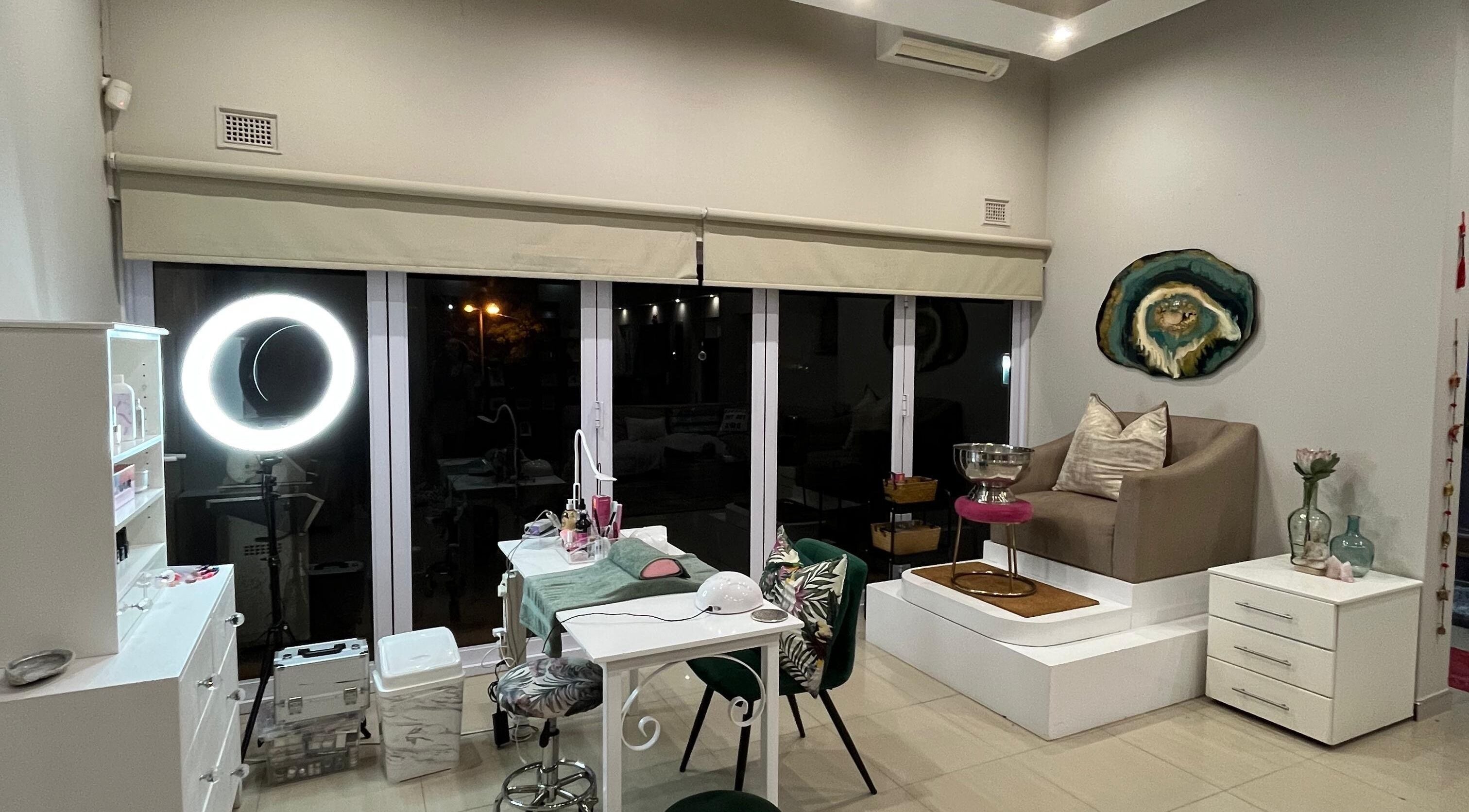 Elegant beauty room at Jackie Bee Aesthetics, Ballito, Kwazulu-natal, ZA, showcasing luxe spa seating.