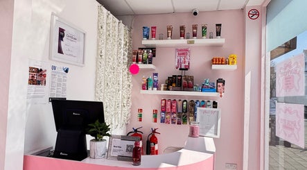 Elegant reception area at Sevens with beauty products on display shelves, Cardiff, Wales, GB.