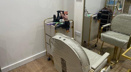 Stylish salon chair and hairdressing tools at Hijabi Hair, Bristol, England, GB.