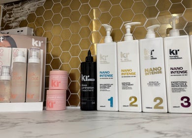 Hair products display at Hijabi Hair, Bristol, England, GB. Showcases Silk Coat and Nano Intense Keratin treatments.