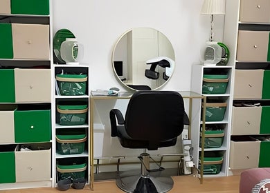 Dexters Lab beauty workspace in London, England, GB with chair and organized storage.