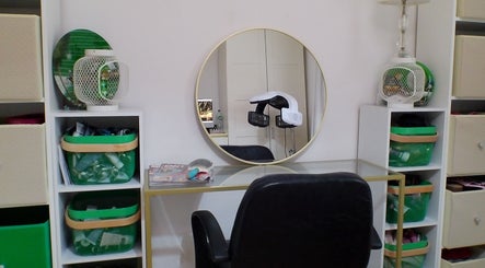 Modern beauty station at Dexters Lab, London, England, GB featuring sleek decor and organized storage.