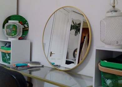 Chic workspace with a round mirror at Dexters Lab, London, England, GB.