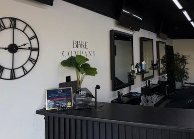 Reception area of Blake Company in Kenilworth, England, featuring a stylish decor and award display.