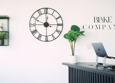 Blake Company reception with clock and decor in Kenilworth, England, GB.