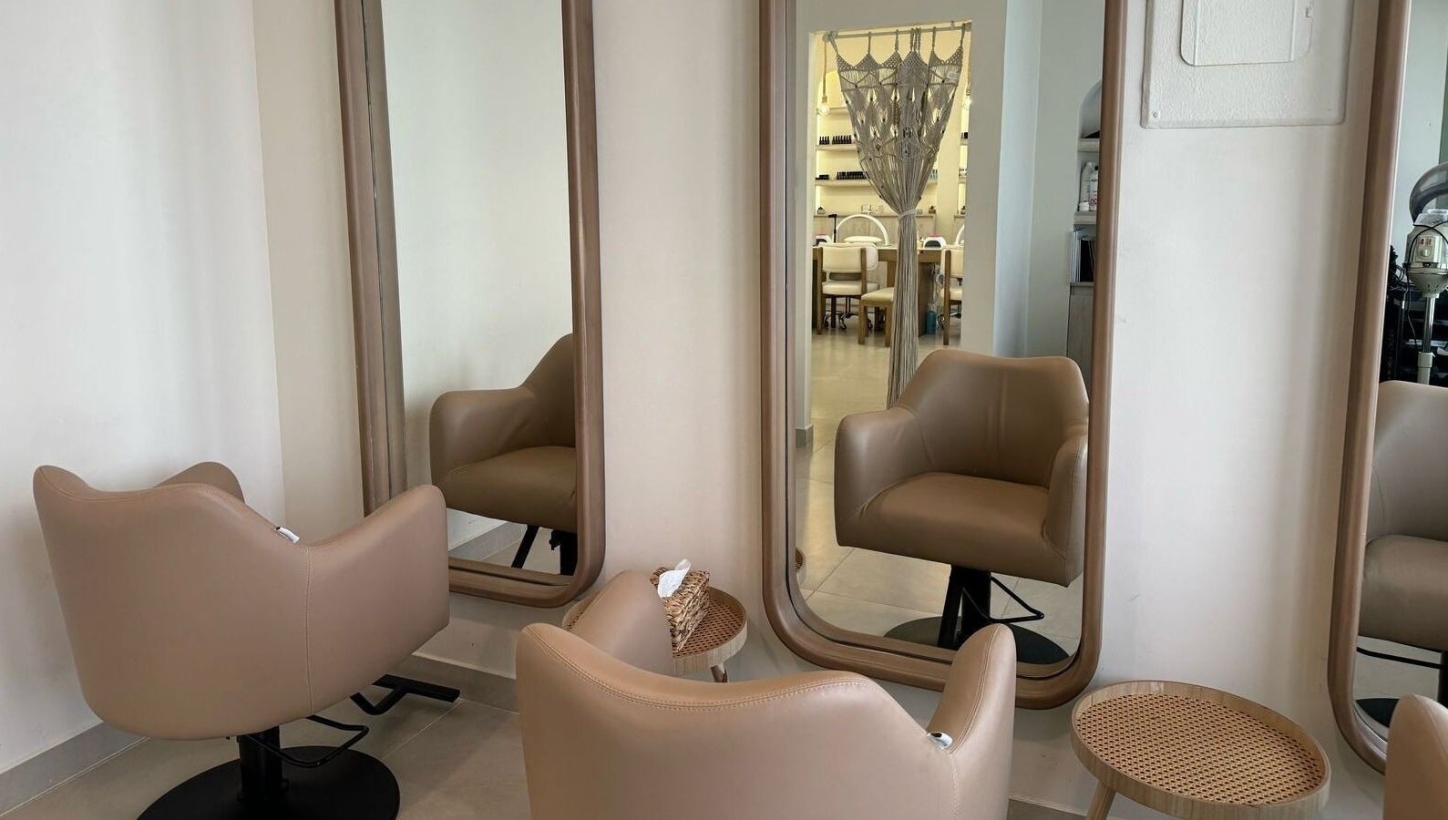 Elegant styling chairs and mirrors at Olva Spa I أولفا سبا in Riyadh, Riyadh Province, SA, offering a serene setting.