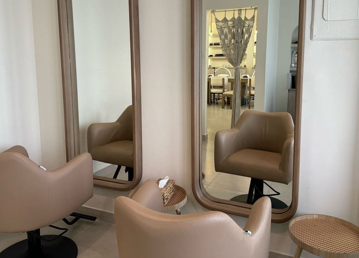 Elegant styling chairs and mirrors at Olva Spa I أولفا سبا in Riyadh, Riyadh Province, SA, offering a serene setting.