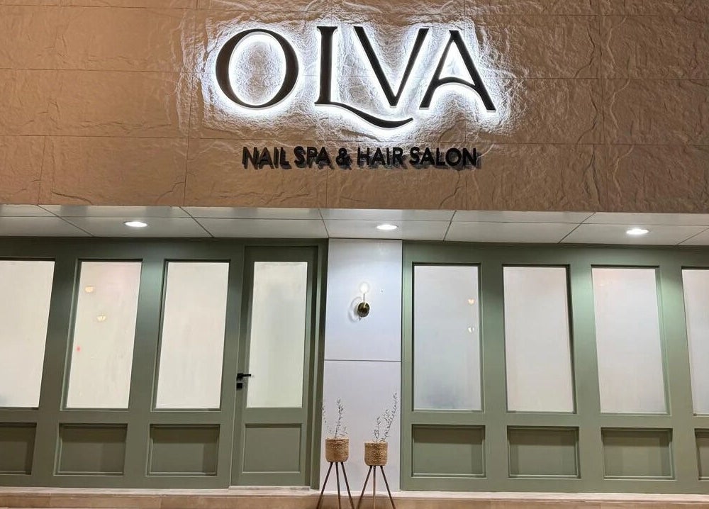 Front entrance of Olva Spa I أولفا سبا in Riyadh, Riyadh Province, SA with elegant signage and decor.