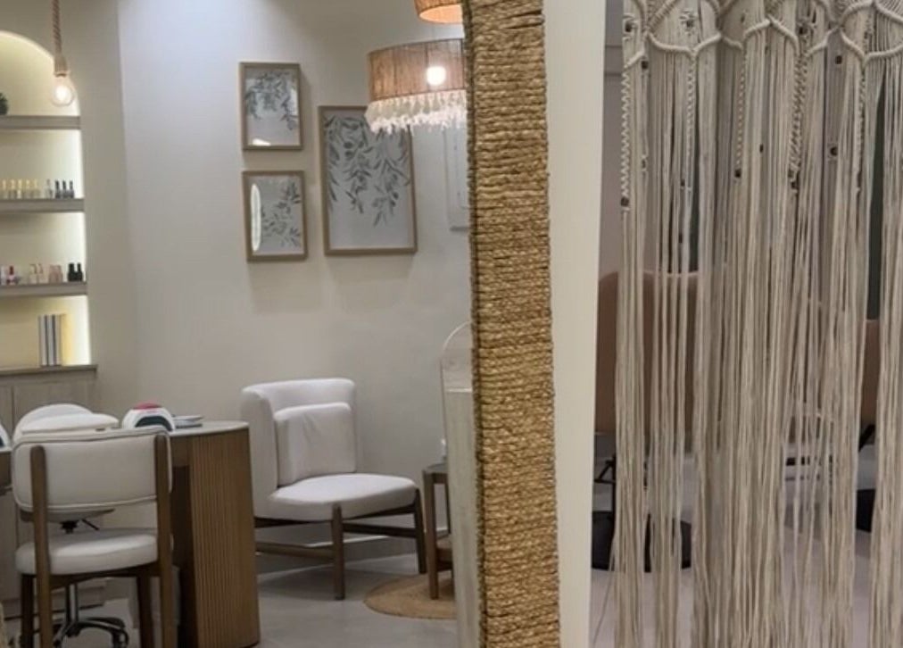 Serene interior of Olva Spa I أولفا سبا in Riyadh, with chairs and decor, promoting relaxation and wellness.