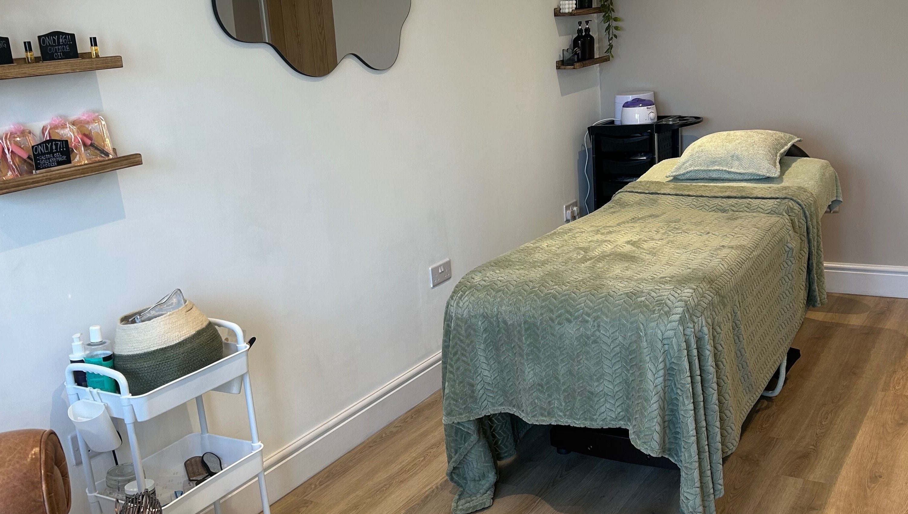Relaxing treatment room at Sophie’s Ultimate Beauty, Deeping Saint James, England, GB.