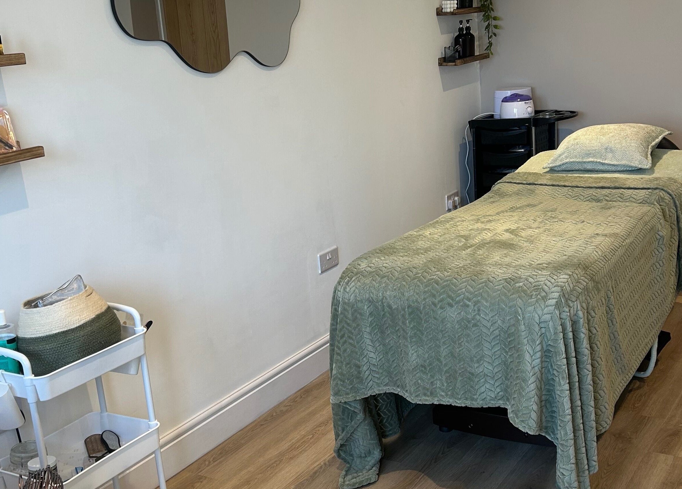 Relaxing treatment room at Sophie’s Ultimate Beauty, Deeping Saint James, England, GB.