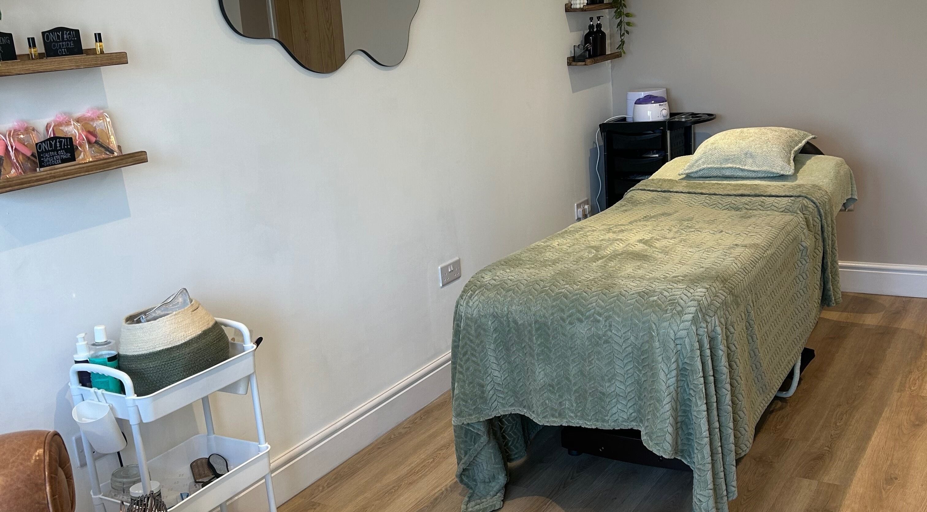 Relaxing treatment room at Sophie’s Ultimate Beauty, Deeping Saint James, England, GB.