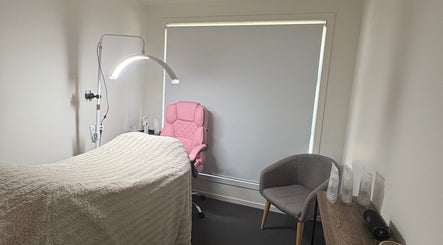 Tranquil beauty treatment room at JH Beauty in Upper Caboolture, Queensland, AU with soft lighting and modern decor.