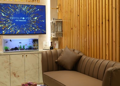 Cozy seating area in Vivo Mumbai, featuring a luxurious couch and award display in Mumbai, Maharashtra, IN.