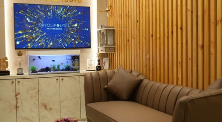 Cozy seating area in Vivo Mumbai, featuring a luxurious couch and award display in Mumbai, Maharashtra, IN.