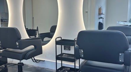 Modern salon chairs at Hair by Shannon Summers, Leicester, England, GB. Elegant and stylish interior.