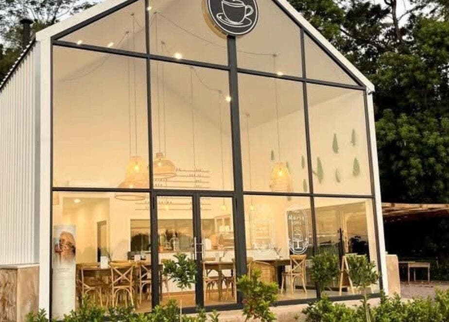 Modern facade of Rovel Beauty Studio Rayton in Rayton, Gauteng, ZA with inviting interior lighting.