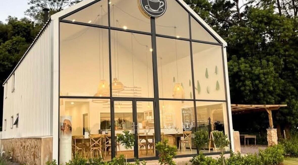 Modern facade of Rovel Beauty Studio Rayton in Rayton, Gauteng, ZA with inviting interior lighting.