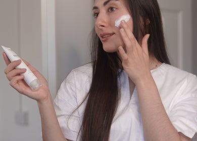 Woman applying skincare at Nonna Skincare, Dublin, County Dublin, IE.
