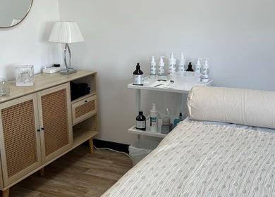 Tranquil treatment room at Niche Beauty by Lisa in Rochester, England, GB, featuring a cozy massage bed.