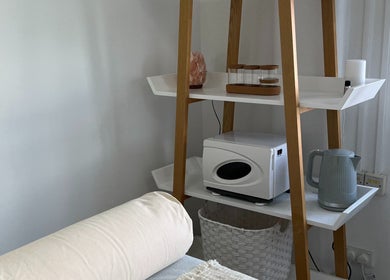 Comforting interior at Niche Beauty by Lisa in Rochester, England featuring wellness tools and cozy decor.