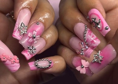 Bright pink, intricately designed nails at Klaw Cartel, Birmingham, England, GB.