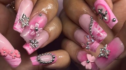 Bright pink, intricately designed nails at Klaw Cartel, Birmingham, England, GB.