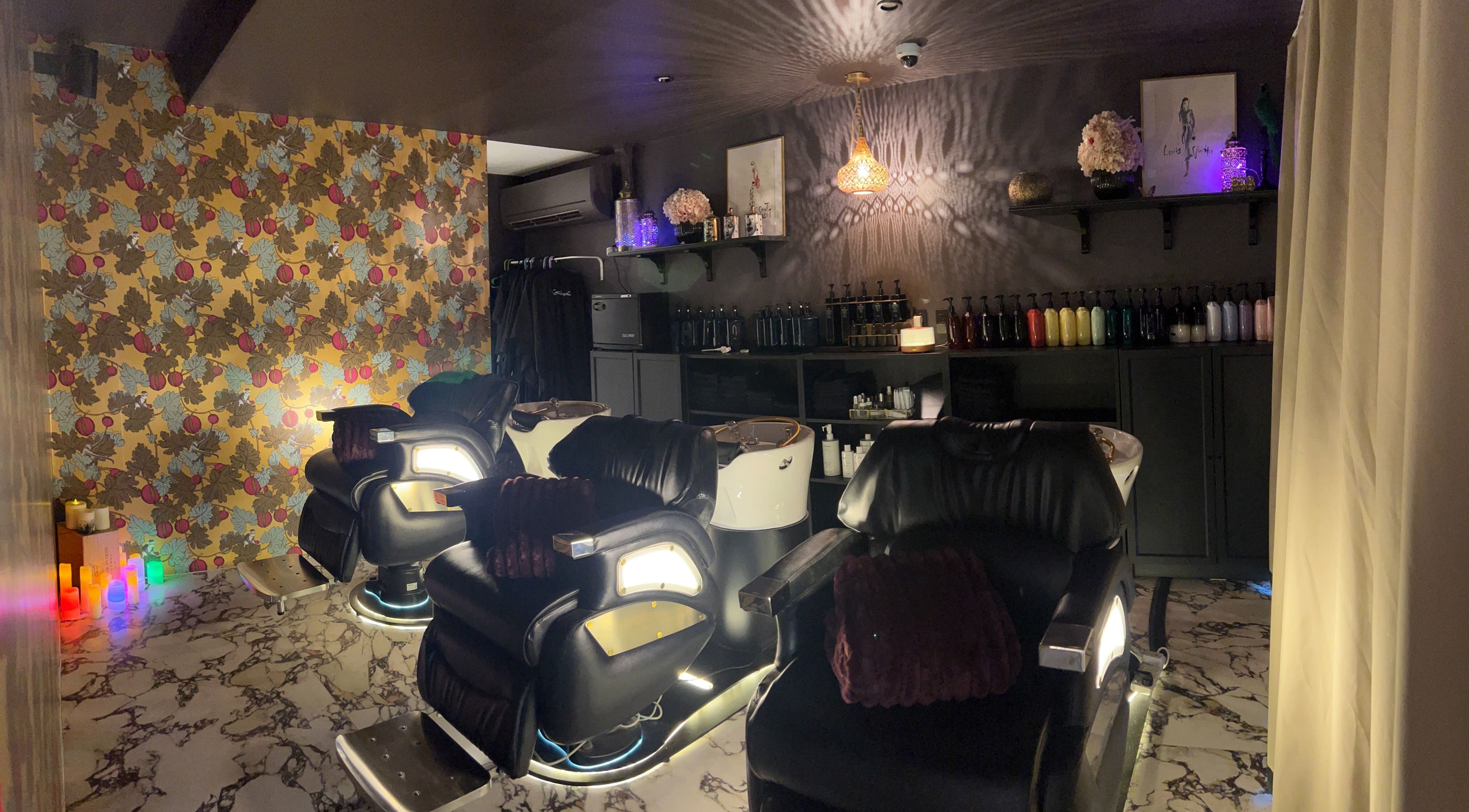 Luxurious salon chairs in a stylish setting at Kaitlyn Wagner Hairdressing, Hawthorne, Queensland, AU.