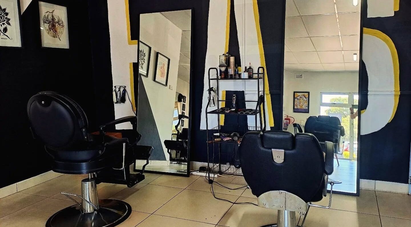 Elegant barber chairs and mirrors at Shauno The Barber, Durban, Kwazulu-natal, ZA.