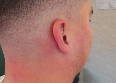 Close-up of fresh fade haircut at Shauno The Barber in Durban, Kwazulu-natal, ZA.