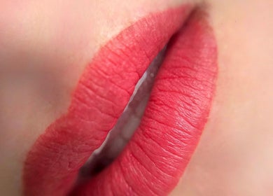 Close-up of vibrant red lips at SC Beauty - DTLA in Los Angeles, California, US, showcasing lip artistry.