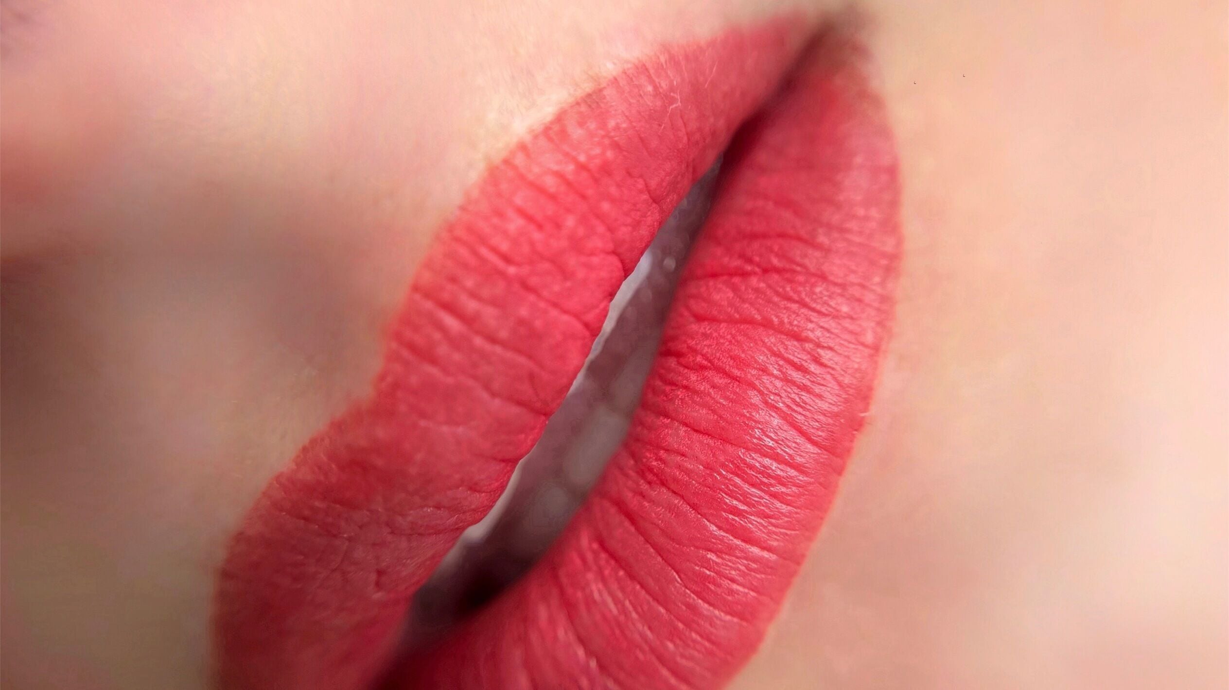 Close-up of vibrant red lips at SC Beauty - DTLA in Los Angeles, California, US, showcasing lip artistry.