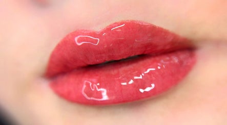 Close-up of glossy pink lips at SC Beauty - DTLA, Los Angeles, California, US.