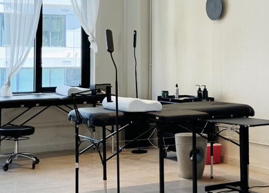 Modern treatment room at SC Beauty - DTLA in Los Angeles, California, US. Featuring comfortable massage beds.