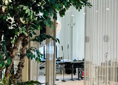 SC Beauty - DTLA, Los Angeles, California, US: tranquil spa area with lush greenery and treatment tables.