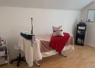 Comfortable treatment room at Glow Up By Gia in Hemsworth, West Yorkshire, England, GB with modern decor.