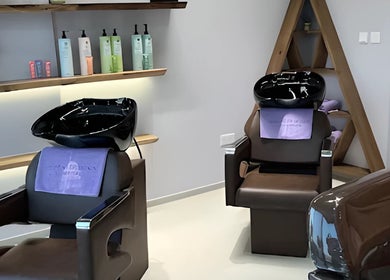 Chic hair wash stations at Lavender Moon Ladies Salon, Dubai, AE, offering comfort and style in a serene setting.