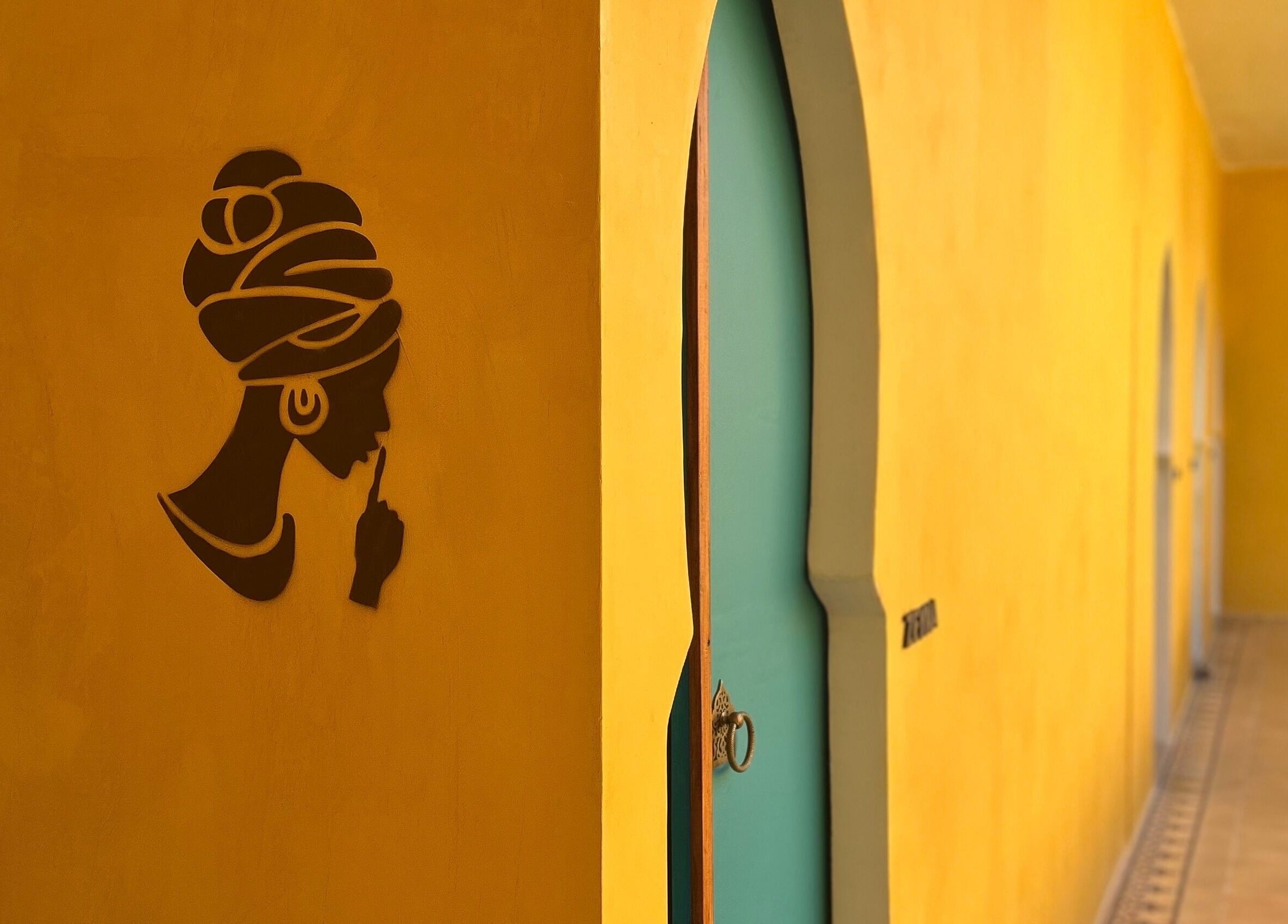 Artistic silhouette on vibrant wall at Limu Spa Moroccan in Bali, Bali, ID. Inviting and tranquil atmosphere.