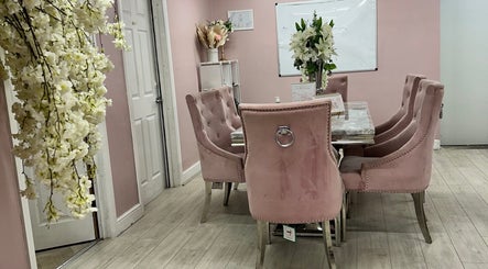 Elegant pink velvet chairs in a serene meeting room at Rhilaxandrhivive, Barnsley, England, GB.