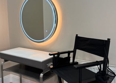 Chic makeup station at Sorelle Beauty House, Lytham St Annes, England, GB with illuminated round mirror.