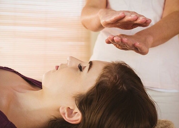 Therapist performing holistic massage at For Her Holistic & Therapeutic Massage in Edinburgh, Scotland, GB.